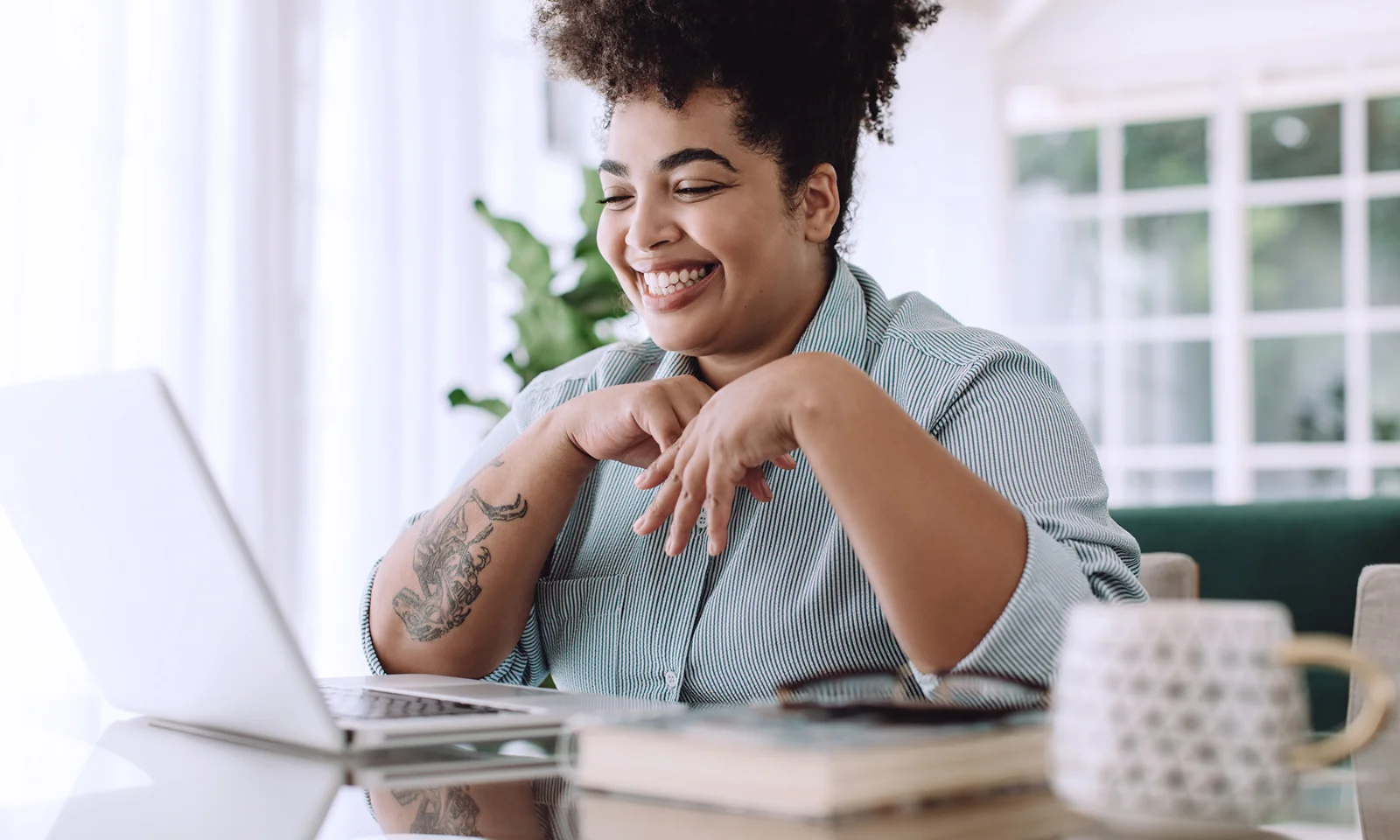 Smiling professional enjoying a video call from home smaragd-image-home-06.jpg